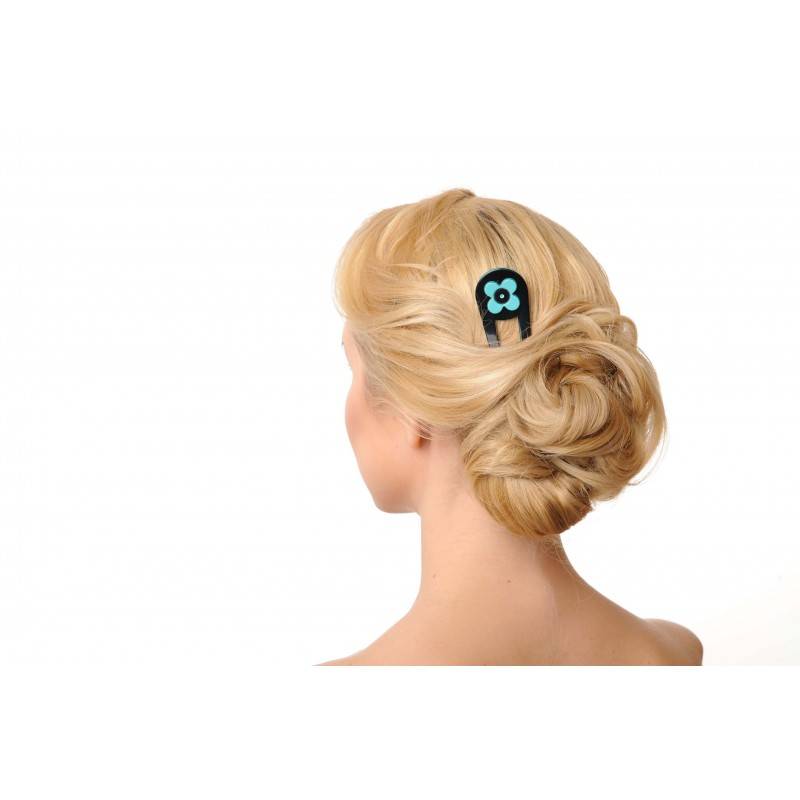 model wearing hair pin with flower